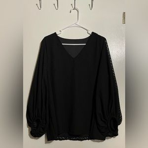 Black blouse with puffy sheer sleeves